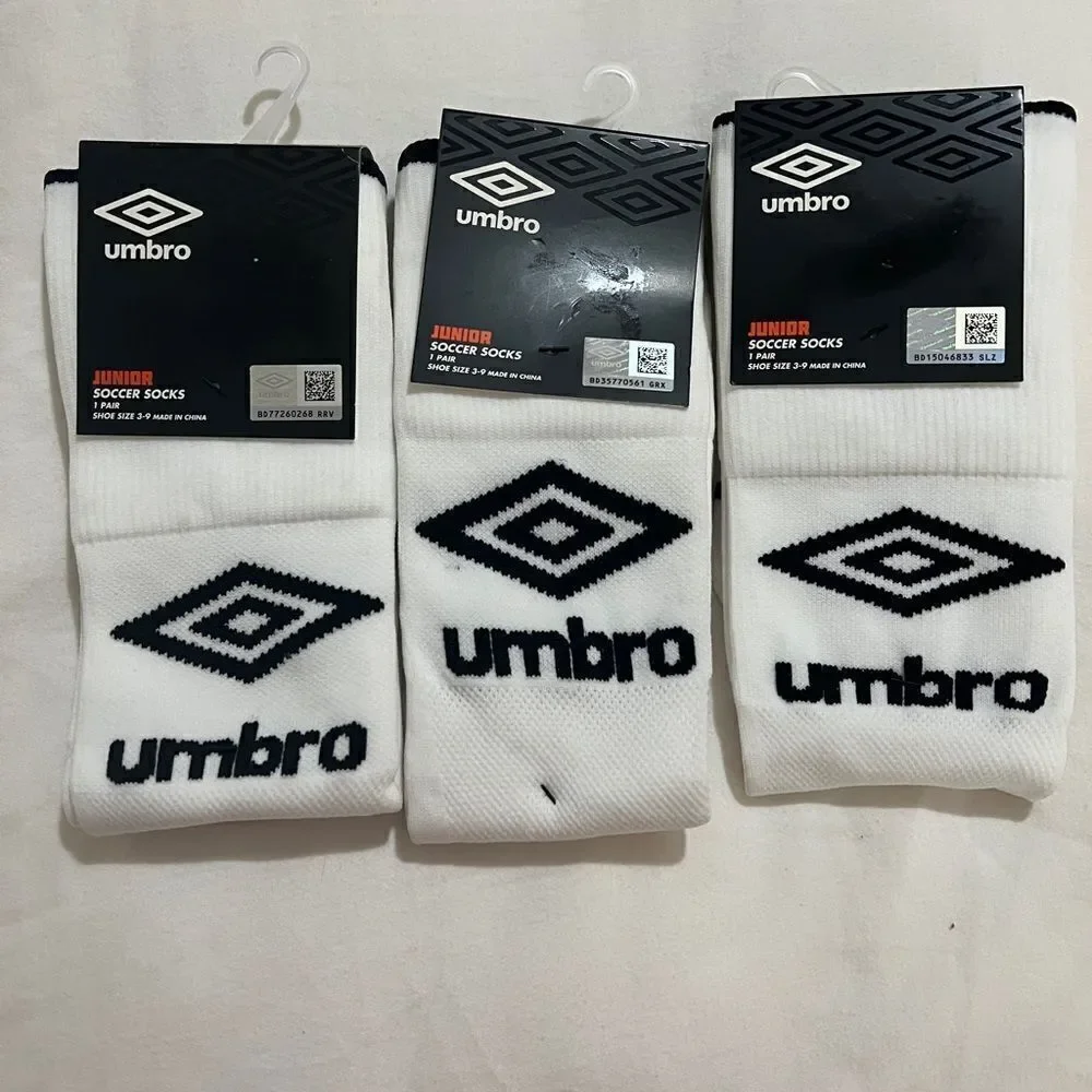 Umbro Junior Soccer Socks. Shoe size 3-9. 3 pairs!